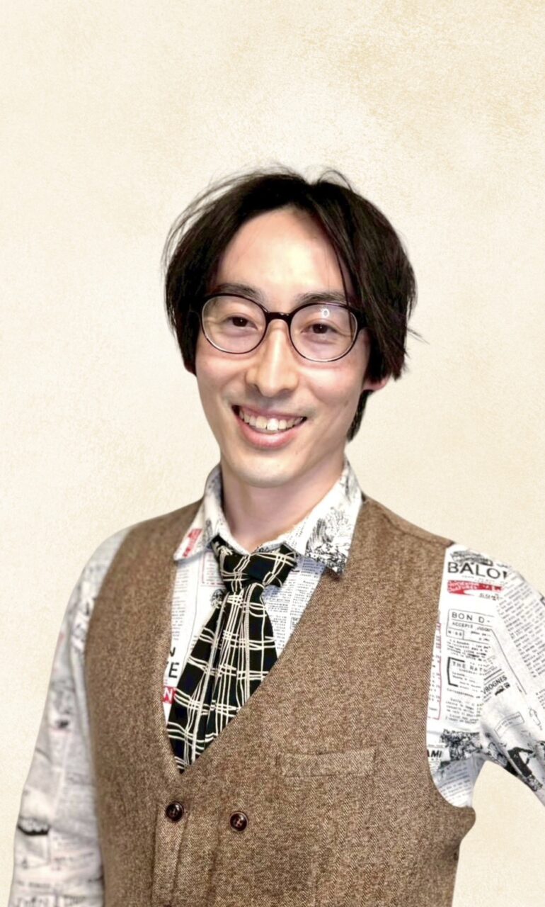湯村 康春
